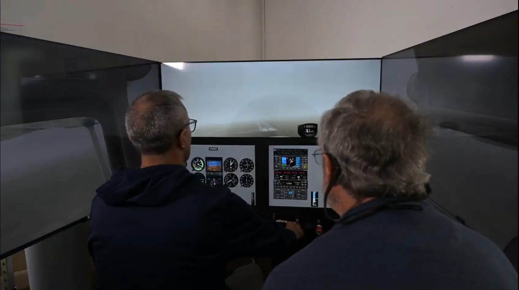 Instructor and student flying a low-visibility landing in the Solid Ground simulator