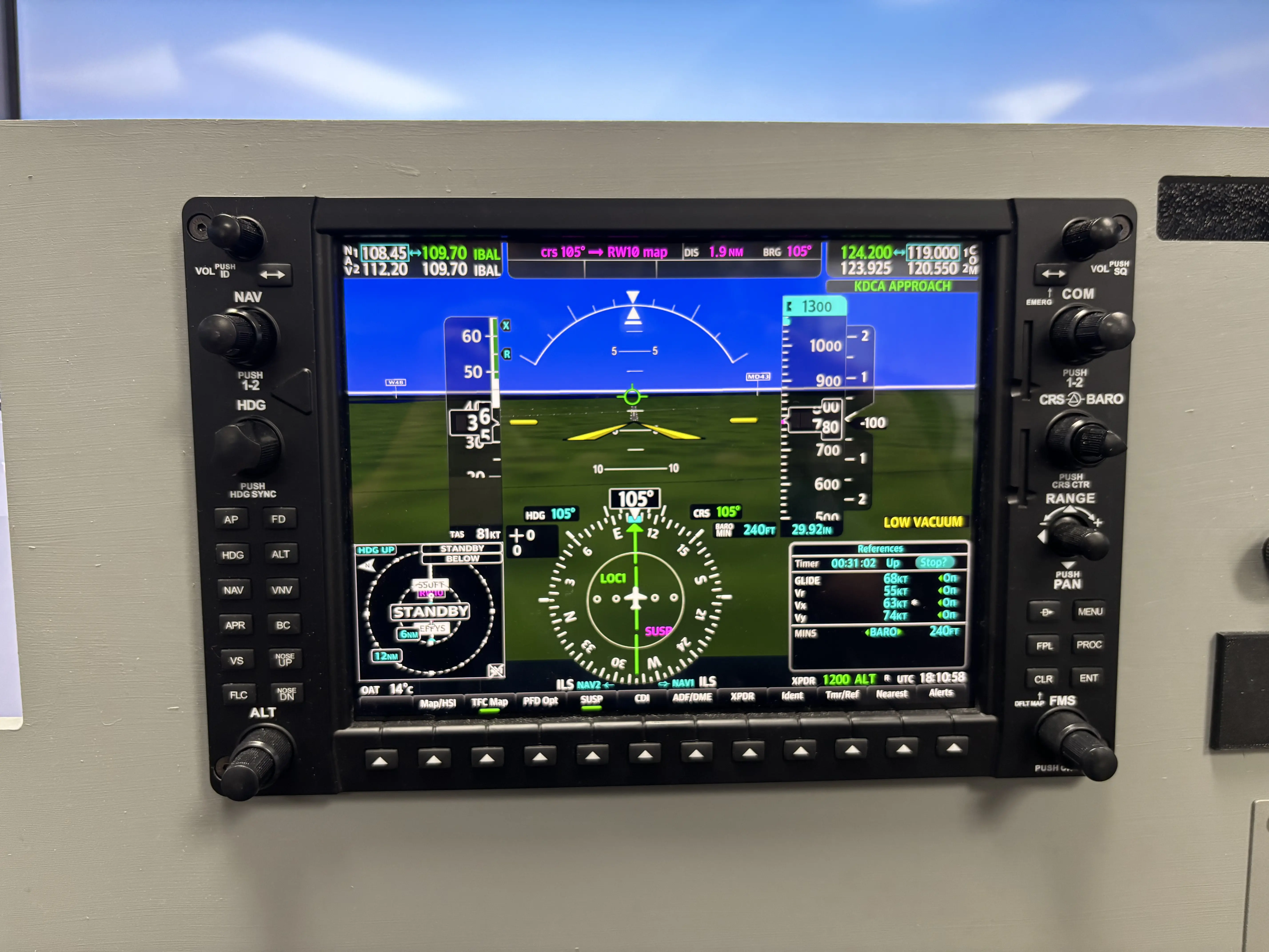 Garmin G1000 primary flight display with real knobs and buttons on the SG-2A AATD simulator, set up for an ILS approach